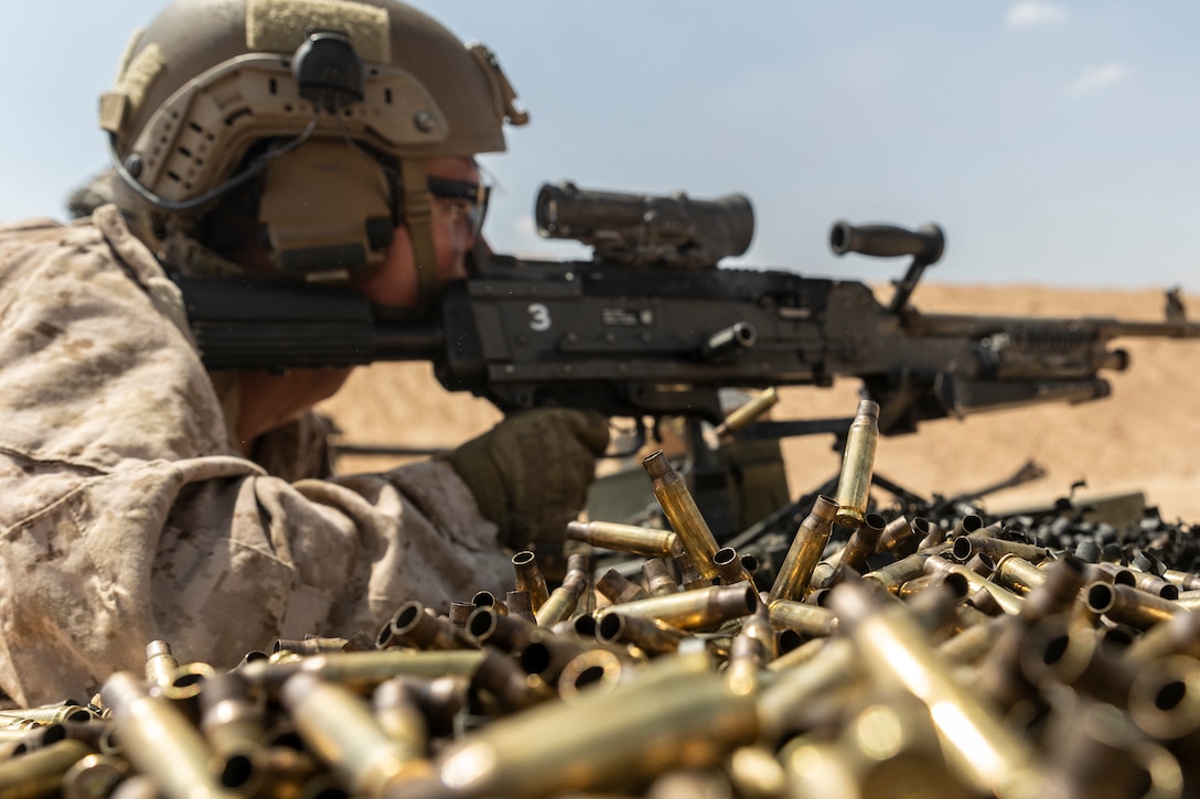 A U.S. Marine with Fleet Anti-terrorism Security Team Central Command fires the M240B machine gun during exercise Bright Star 23 at Mohamed Naguib Military Base (MNMB), Egypt, Sept. 5, 2023. Bright Star 23 is a multilateral U.S. Central Command exercise held with the Arab Republic of Egypt across air, land, and sea domains that promotes and enhances regional security and cooperation, and improves interoperability in irregular warfare against hybrid threat scenarios. (U.S. Marine Corps photo by Lance Cpl. Samuel Qin)