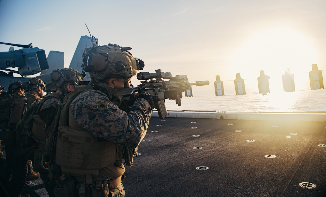 U.S. Marines with Charlie Company, Battalion Landing Team 1/6, 26th Marine Expeditionary Unit (Special Operations Capable) (26MEU(SOC)), conduct a dry fire rehearsal on the flight deck of the San Antonio-class amphibious transport dock ship USS Mesa Verde (LPD 19) in the Mediterranean Sea, Nov. 3, 2023. The San Antonio-class amphibious transport dock ship USS Mesa Verde, assigned to the Bataan Amphibious Ready Group and embarked 26th MEU(SOC), under the command and control of Task Force 61/2, is on a scheduled deployment in the U.S. Naval Forces Europe area of operations, employed by U.S. Sixth Fleet to defend U.S., allied and partner interests. (U.S. Marine Corps photo by Cpl. Aziza Kamuhanda)