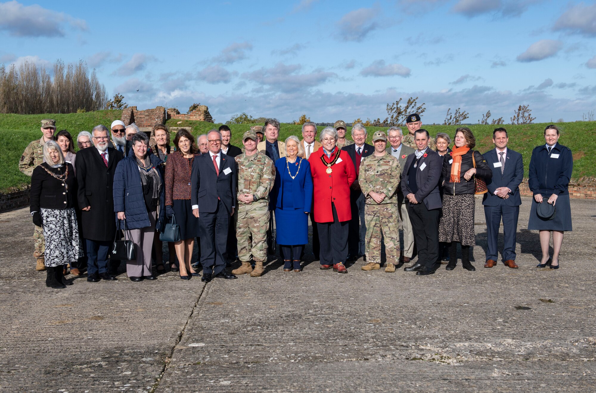 Local civic leaders and members of the 501st Combat Support Wing pose for a photo at RAF Croughton