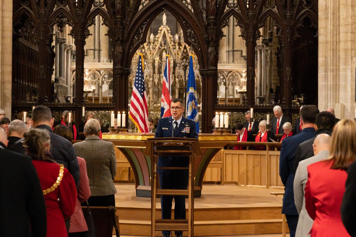U.S. Air Force Chaplain (Lt. Col.) Kelly Stahl, speaks to U.S. Airmen from Royal Air Force Mildenhall and RAF Lakenheath during the annual Thanksgiving Eve service at Ely Cathedral, Ely, England, Nov. 22, 2023.