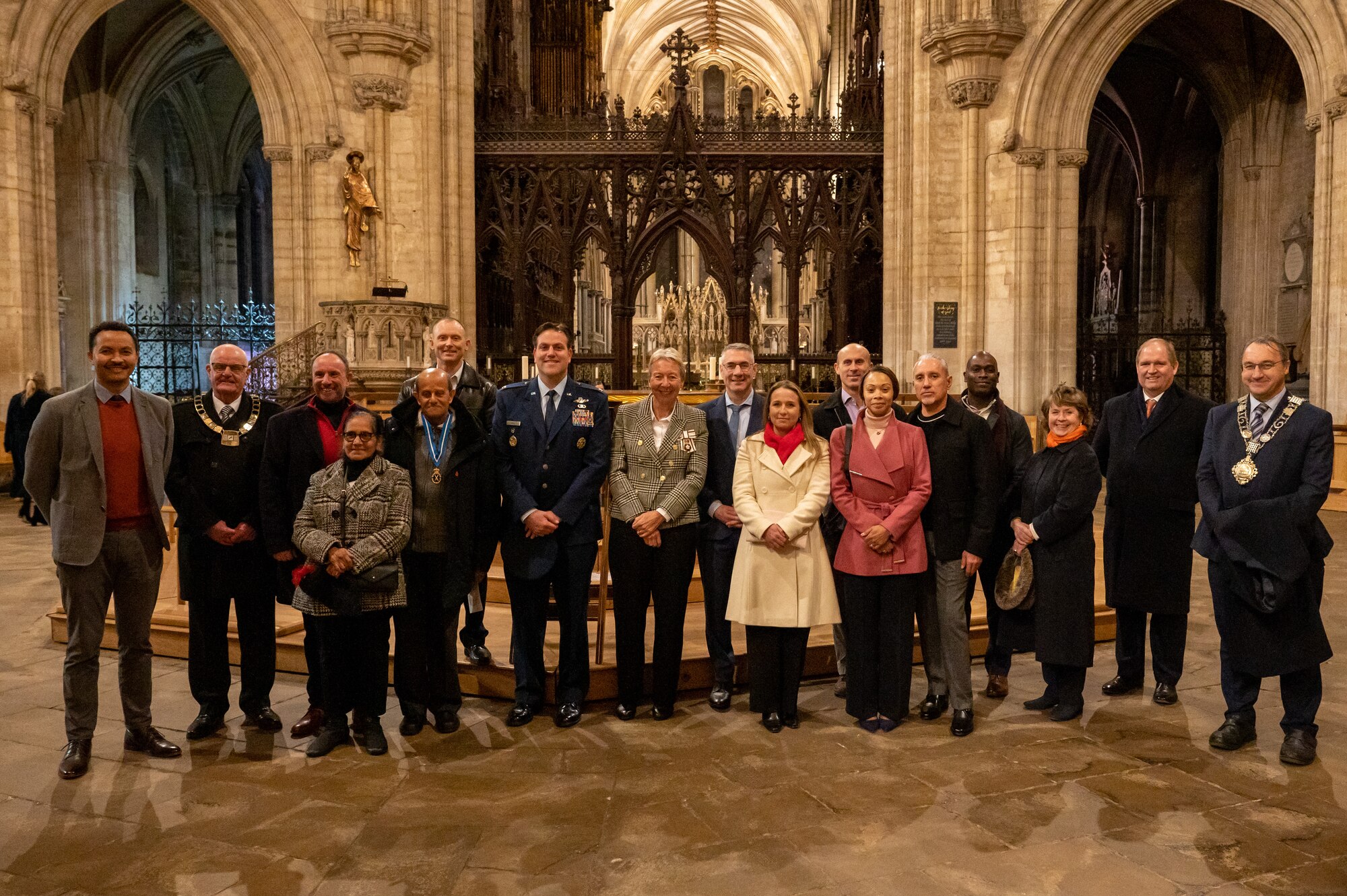 Leadership from Royal Air Force Mildenhall and RAF Lakenheath, stand with community leaders for a photo, following the annual Thanksgiving Eve service at Ely Cathedral, Ely, England, Nov. 22, 2023.
