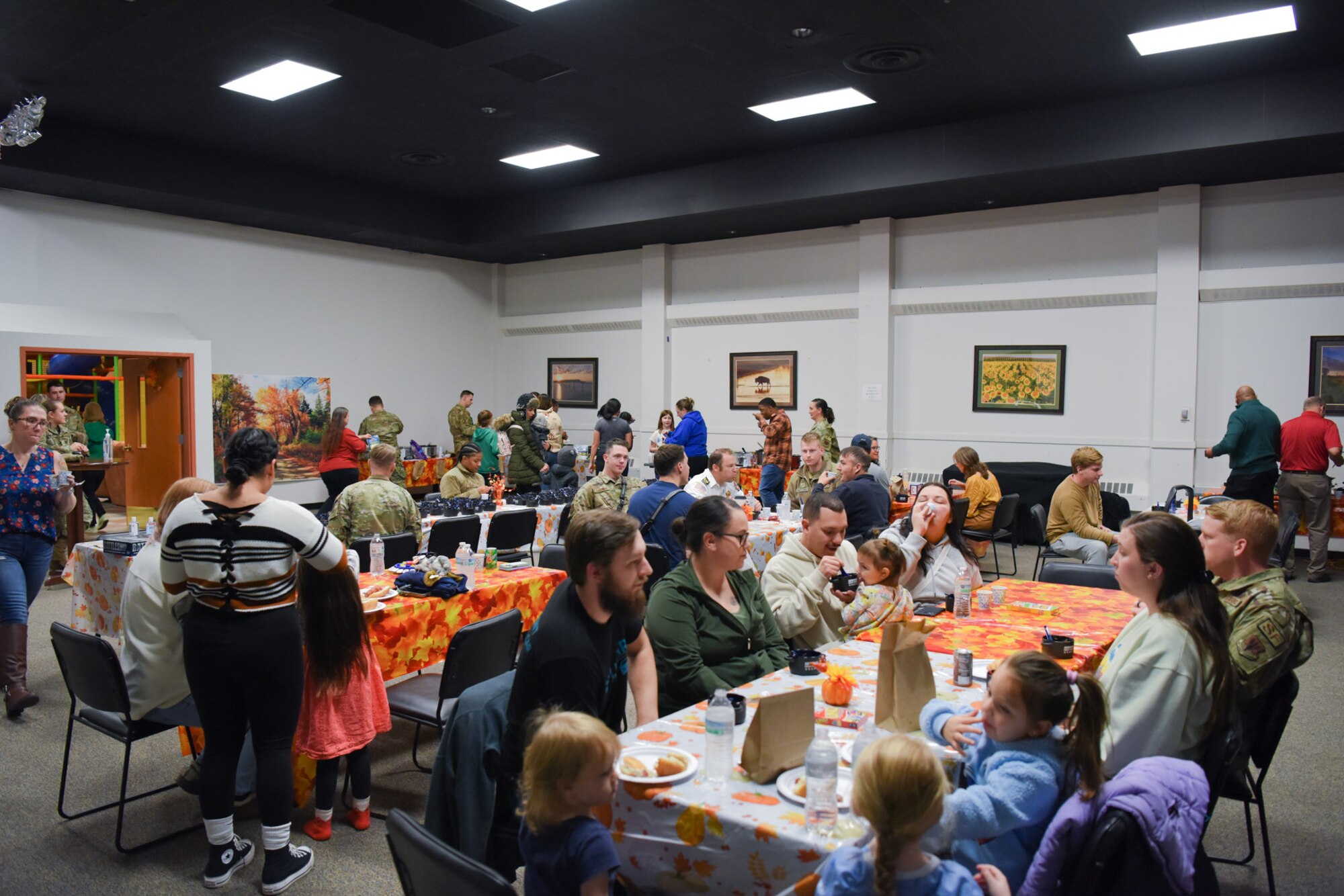 Airmen enjoying the soup supper with their families.