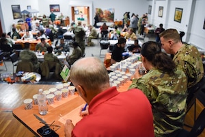 Airmen enjoying the soup supper with their families.