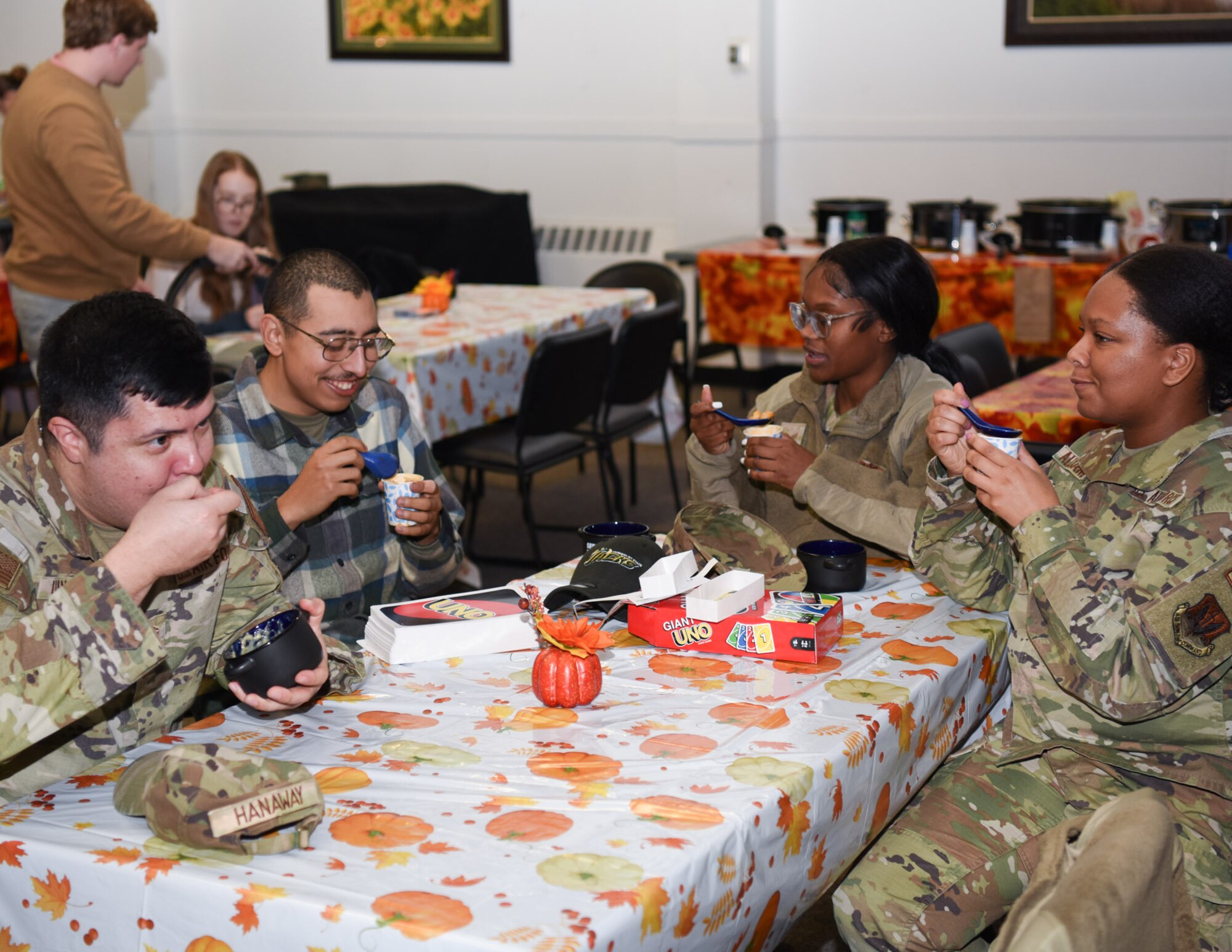 Airmen enjoying the soup supper with their families.