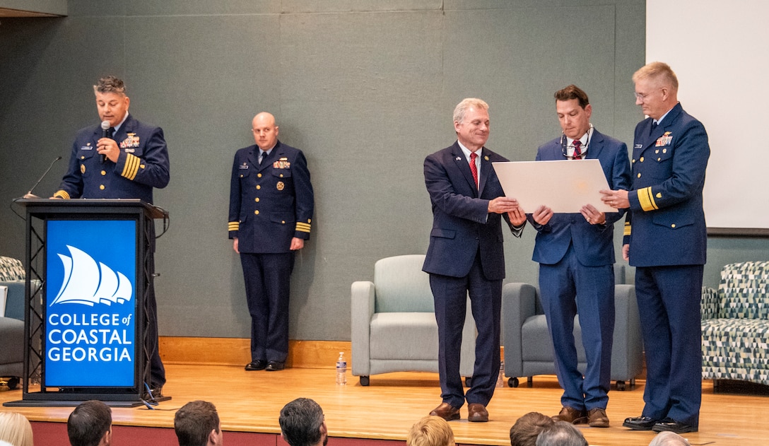 The Coast Guard presents public service awards to maritime partners for their commendable actions during the motor vessel Golden Ray capsizing and subsequent response during a ceremony, Oct. 27, 2023, at the Southeast Georgia Conference Center.