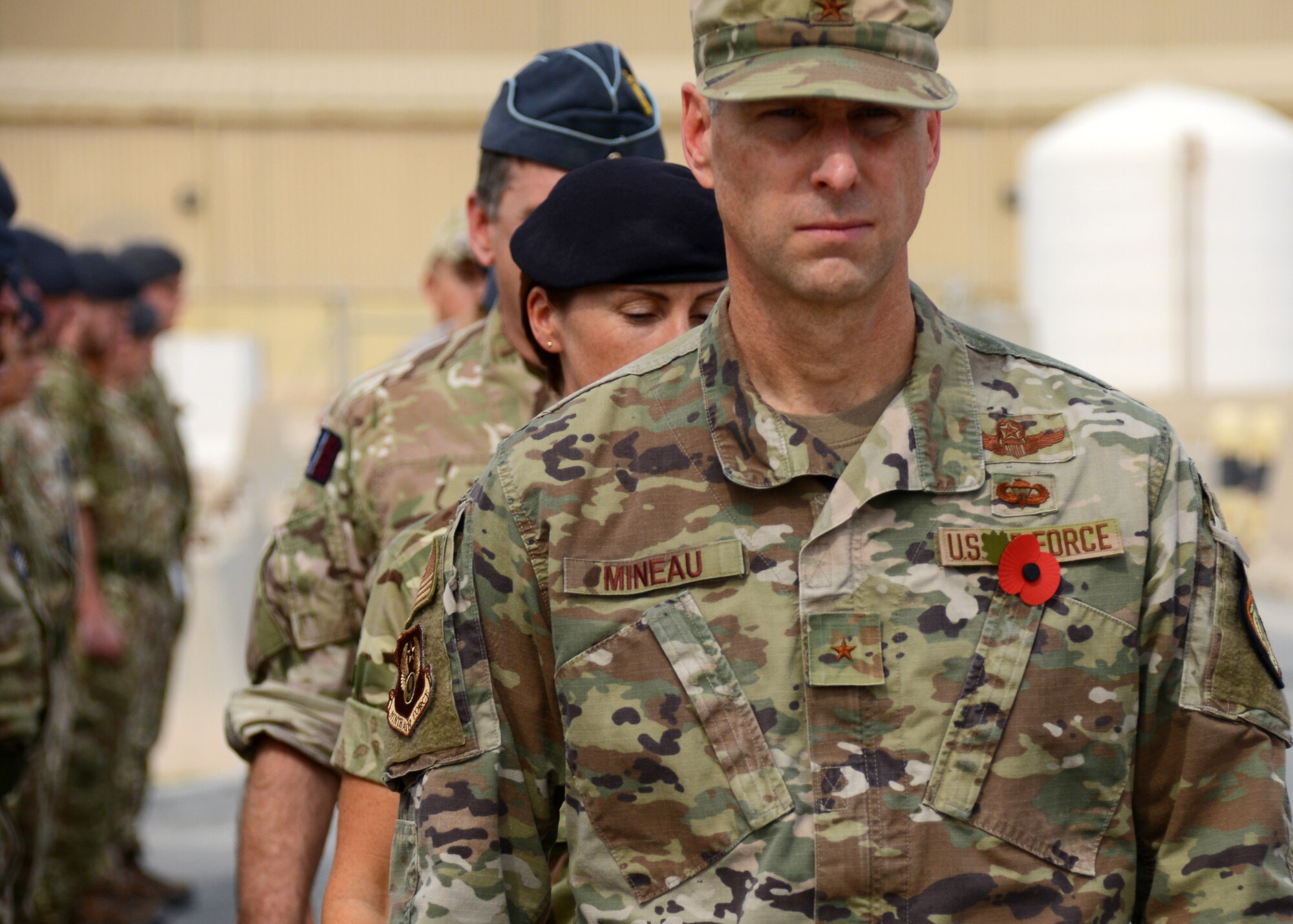 Brig. Gen. David Mineau, Ninth Air Force Deputy commander, departs from the Remembrance Day formation at an undisclosed location within the U.S. Central Command area of responsibility.