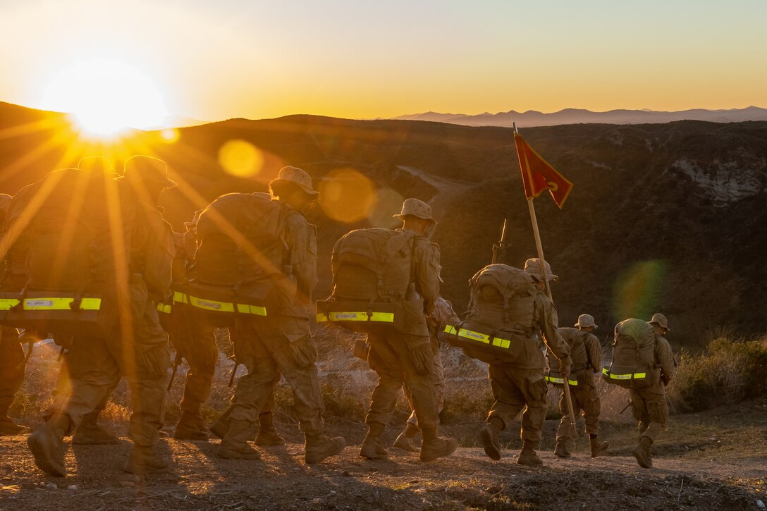 U.S. Marine Corps recruits with Charlie Company, 1st Recruit Training Battalion, hike the Reaper, a Crucible event, at Marine Corps Base Camp Pendleton, California, Nov. 21, 2023. The Reaper is the final portion of the Crucible which marks the transformation of recruits to Marines. (U.S. Marine Corps photo by Cpl. Alexander O. Devereux)