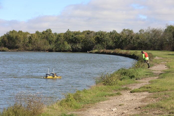 Roger Stillick, U.S. Army Corps of Engineers (USACE), Galveston District (SWG), Advanced Data Section drone operator, controls the Z-boat, a remote hydrographic survey vessel, on a section of the Trinity River, Nov. 15, 2023.