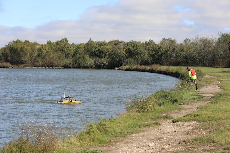 Roger Stillick, U.S. Army Corps of Engineers (USACE), Galveston District (SWG), Advanced Data Section drone operator, controls the Z-boat, a remote hydrographic survey vessel, on a section of the Trinity River, Nov. 15, 2023.