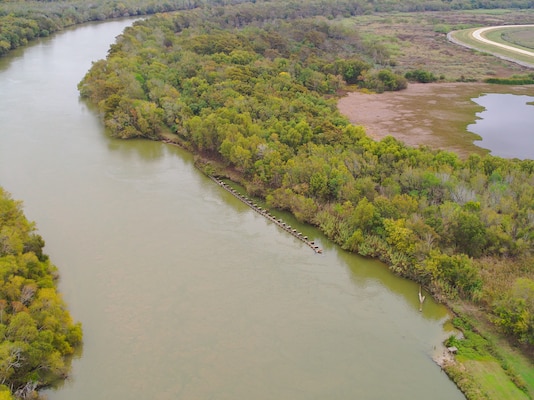 This photograph was captured by Rebecca Capps, U.S. Army Corps of Engineers (USACE), Galveston District (SWG), physical scientist and drone operator, as she flew a Skydio X2D quadcopter, a rotary wing drone, over a section of the Trinity River, Nov. 15, 2023.