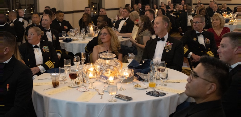 Attendees listen to speakers at the 2023 San Diego Area Navy Chaplain Corps Ball in San Diego, California, Oct. 19, 2023. This was the first chaplains' ball in the area since 2019 due to COVID-19.  (U.S. Marine Corps photo by Staff Sgt. Melissa L. Karnath)