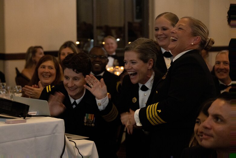 A U.S. Navy chaplain listens to remarks delivered by U.S. Navy Rear Adm. George M. Wikoff, Acting Commander, Naval Air Forces, Naval Air Force, U.S. Pacific Fleet and guest speaker, at the 2023 San Diego Area Navy Chaplain Corps Ball, San Diego, California, Oct. 19, 2023. This year Navy chaplains are celebrating 248 years of service on their birthday, November 28th. This was the first Navy chaplain’s ball since 2019 due to COVID-19. (U.S. Marine Corps photo by Staff Sgt. Melissa L. Karnath)