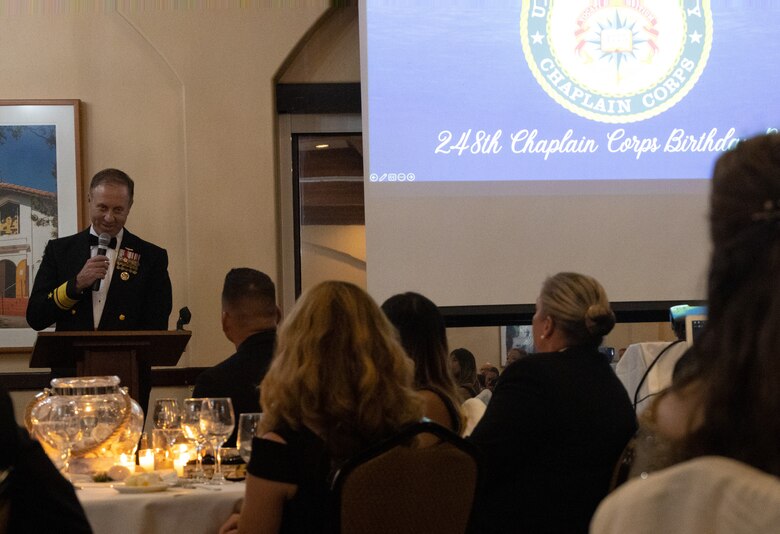 U.S. Navy chaplains and their guests listen to remarks delivered by U.S. Navy Rear Adm. George M. Wikoff, Acting Commander, Naval Air Forces, Naval Air Force, U.S. Pacific Fleet, and guest speaker, at the 2023 San Diego Area Navy Chaplain Corps Ball, San Diego, California, Oct. 19, 2023. Wikoff is a native of New Brunswick, New Jersey. This year Navy chaplains are celebrating 248 years of service on their birthday, November 28th. (U.S. Marine Corps photo by Staff Sgt. Melissa L. Karnath)