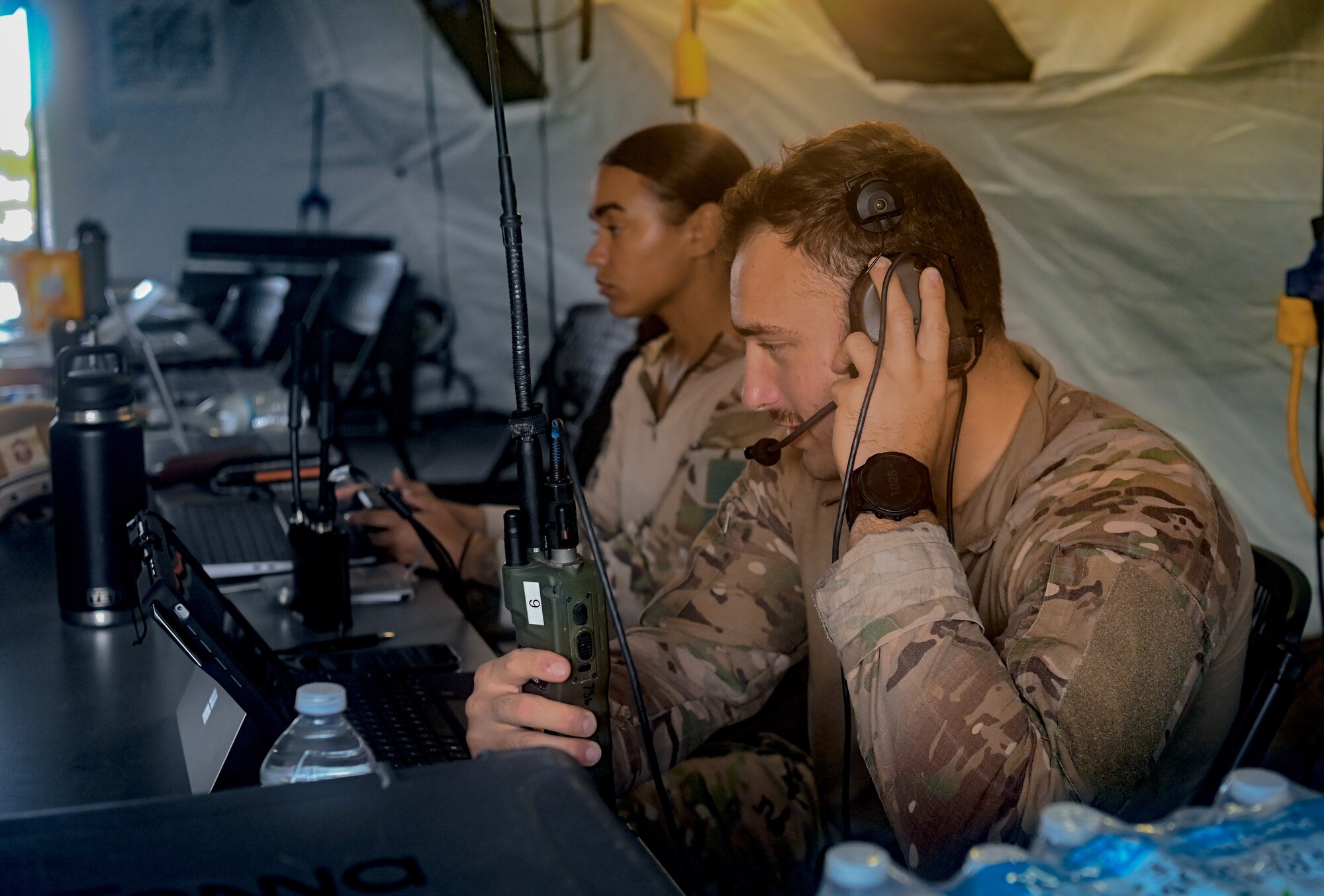 U.S. Air Force Airmen with the 644th Combat Communications Squadron set up a connection on Pacific Regional Training Center-Andersen, Guam, Nov. 17, 2023. Multiple squadrons assigned to the 36th Wing participated in a simulated deployment exercise to self-evaluate and gauge their skills in a deployed scenario to better accomplish the mission. (U.S. Air Force photo by Senior Airman Allison Martin)