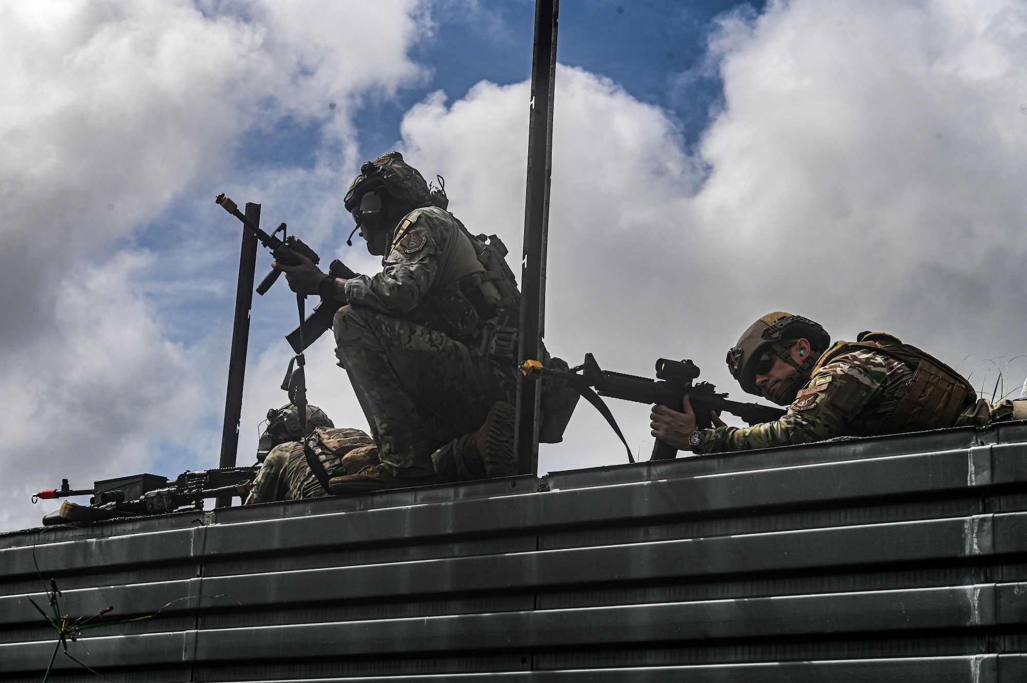 U.S. Air Force Airmen with the 736th Security Forces Squadron guard their base camp on Pacific Regional Training Center-Andersen, Guam, Nov. 17, 2023. Multiple squadrons assigned to the 36th Wing participated in a simulated deployment exercise to self-evaluate and gauge their skills in a deployed scenario to better accomplish the mission.(U.S. Air Force photo by Senior Airman Allison Martin)