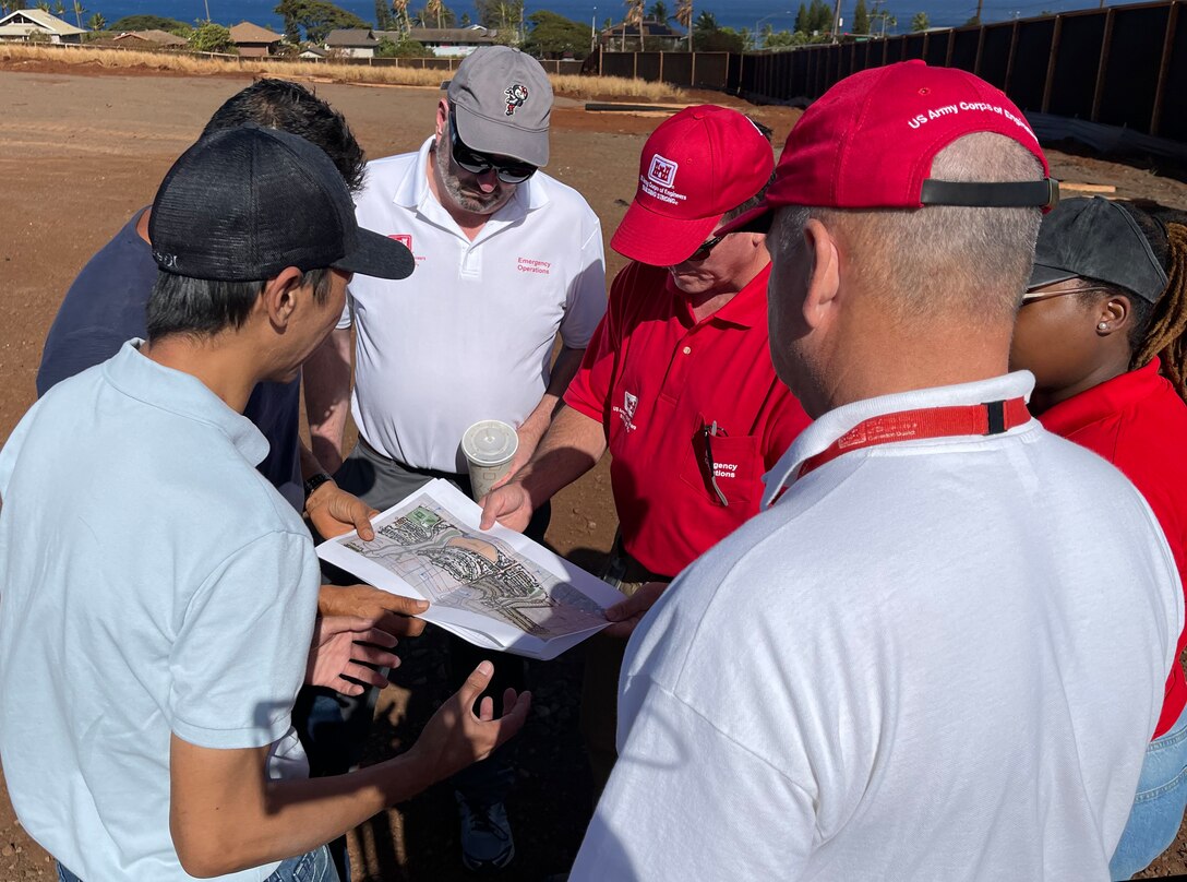 A team of USACE and local leaders meet in the Napili-Honokowai area of Maui Aug. 31 to assess a site for possible use as a temporary school. A school is needed for approximately 700 elementary school students who lost their school to the Hawaii wildfires. (U.S. Army Corps of Engineers photo by Joseph Bruton)