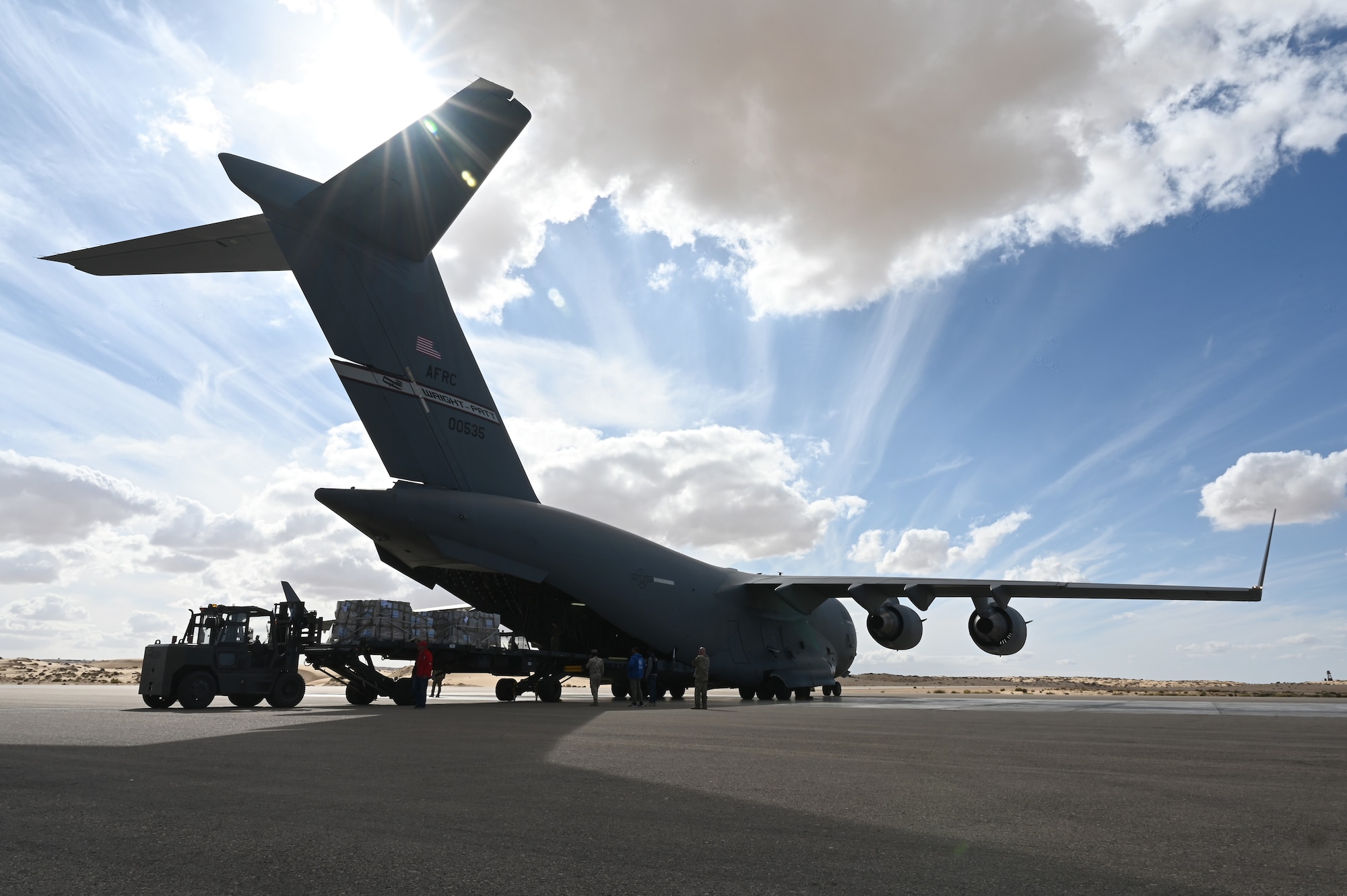 The U.S. Agency for International Development utilizes U.S. Air Force airlift capabilities to transport humanitarian aid throughout the Middle East.