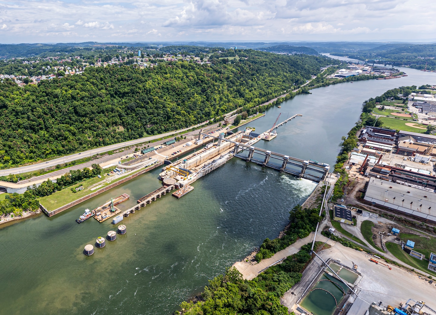 An aerial view of a lock and dam facility on the Monongahela River.