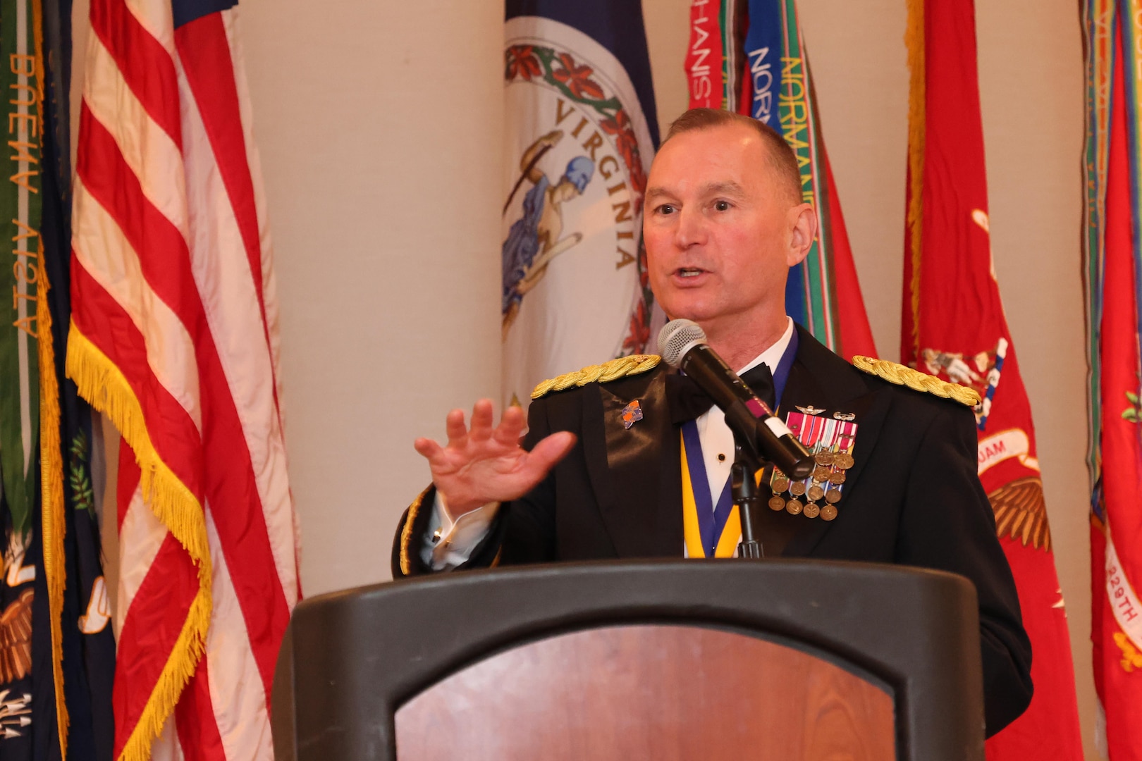Army leader at podium speaking