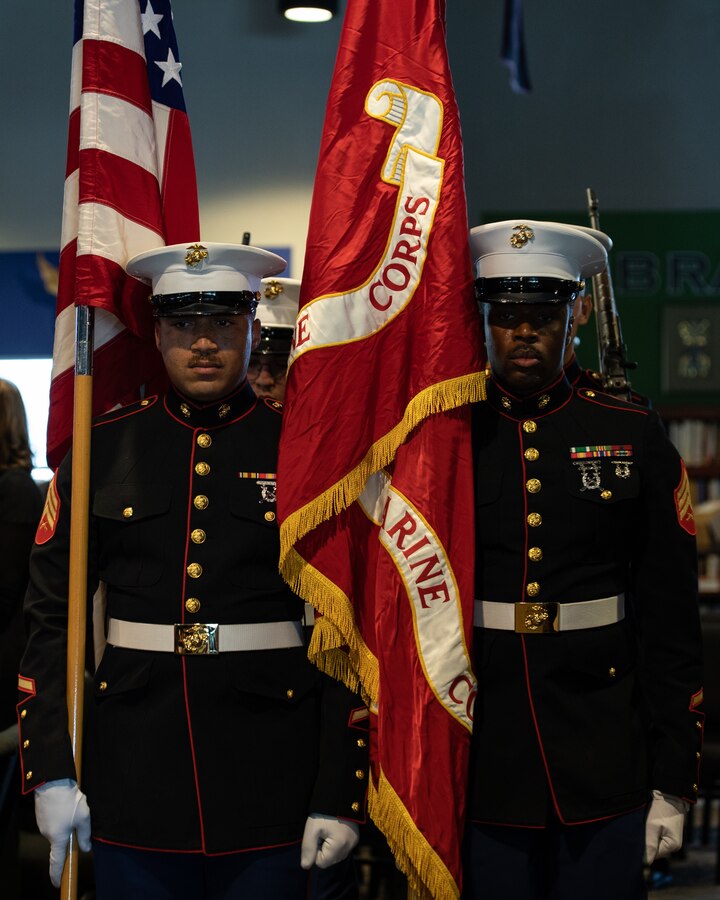 Sgt. Maurice Spicer (left) and Sgt. Jude Guillaume Bulk Fuel Company C 4th Marine Logistics Group, march on the colors in honor of Lt. Col. David Althoff (retired), at the Worship and Praise Church Chandler Arizona, Mar. 19, 2022. Althoff served as a pilot in the Vietnam War and completed over 1,000 combat missions. He is credited with saving hundreds of Marines who were critically wounded in battle and the recipient of three Silver Stars, three Distinguished Flying Crosses, one Bronze Star, one Meritorious Service Medal and 55 Air Medals. (Marine Corps Photo by Lance Cpl. Ashley Corbo)