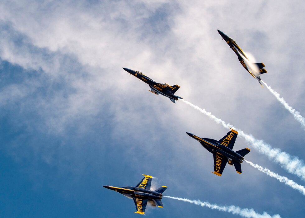 The U.S. Navy Flight Demonstration Squadron, the Blue Angels, perform at the New York Air Show in Montgomery, NY. The Blue Angels perform flight demonstrations at 32 locations across the country to showcase the teamwork and professionalism of the U.S. Navy and Marine Corps to the American public.