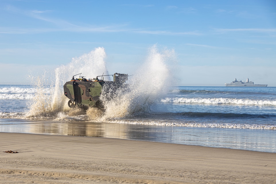 U.S. Marines assigned to the 3rd Assault Amphibian Battalion, 1st Marine Division, conduct waterborne training with an Amphibious Combat Vehicle from shore to loading amphibious transport dock ship USS Anchorage at Marine Corps Base Camp Pendleton, California, Feb. 12, 2022. The two-day waterborne training evolution focused on safety and transport capabilities for both the Marine Corps and Navy and is part of a larger training plan to refine tactics and doctrine for amphibious operations.