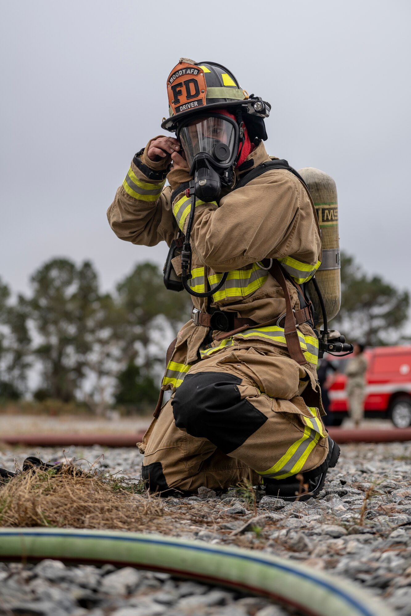 U.S. Air Force Senior Airman Zachary Mabee, 23rd Civil Engineer Squadron crew chief, prepares for live-fire training