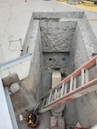 Progress photo of the gudgeon anchor replacement project at McNary Navigation Lock.