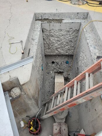Progress photo of the gudgeon anchor replacement project at McNary Navigation Lock.
