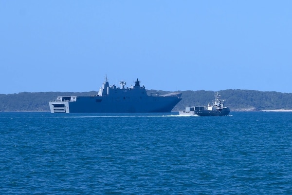 USV Ranger Transits Past HMAS Adelaide During Autonomous Warrior 2023