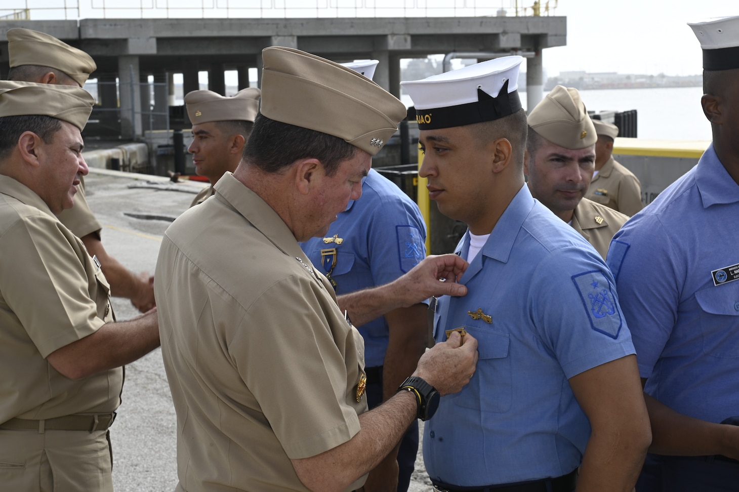 Vice Adm. Orlando Grisales, Colombian Navy Chief of Staff for Naval Operations, presents a Colombian Navy award to a Sailor assigned to Colombian Navy Submarine ARC Pijao during an award ceremony at Naval Station Mayport, Florida.