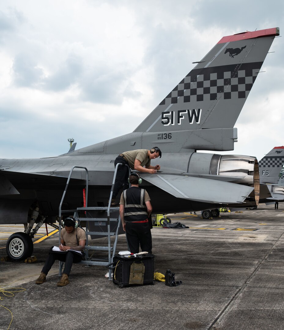 U.S. Air Force maintainers with the 36th Fighter Generation Squadron, Osan Air Base, Republic of Korea, perform a pre-flight maintenance inspection on a U.S. Air Force F-16 Fighting Falcon assigned to 36th Fighter Squadron, during Commando Sling 23 at Lebar Air Base, Republic of Singapore, Nov. 15, 2023.