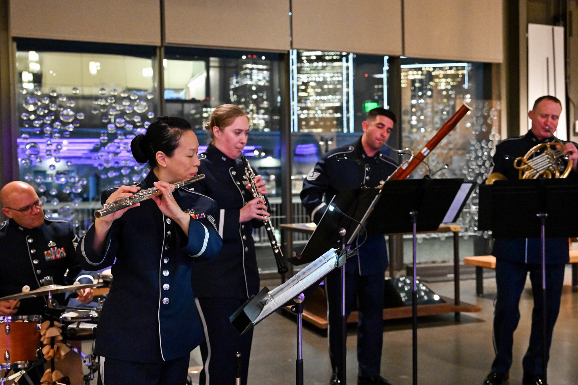 Photo of the band playing at the APEC