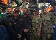 NAPLES, Italy. -  Rear Adm. Stephen Mack, commander, Submarine Group 8, poses for a photo with Rear Adm. Vito Lacerenza, commander, Italian Submarines, aboard the Italian Todaro-class submarine, Scirè (S 527), during U.S. and Italian Navy undersea warfare staff talks, in Naples Italy, Nov. 20, 2023. While in Naples, the Scirè hosted Italian Navy Rear Adm. Vito Lacerenza, Commander of the Submarines, and Rear Adm. Mack, further strengthening the U.S. and Italian partnership. (U.S. Navy photo by Mass Communication Specialist 1st Class Ryan Seelbach)
