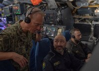 NAPLES, Italy. -  Rear Adm. Stephen Mack, commander, Submarine Group 8, speaks with sonar technicians assigned to the Italian Todaro-class submarine, Scirè (S 527), during U.S. and Italian Navy undersea warfare staff talks, in Naples Italy, Nov. 20, 2023. While in Naples, the Scirè hosted Italian Navy Rear Adm. Vito Lacerenza, Commander of the Submarines, and Rear Adm. Mack, further strengthening the U.S. and Italian partnership. (U.S. Navy photo by Mass Communication Specialist 1st Class Ryan Seelbach)
