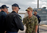 NAPLES, Italy. -  Rear Adm. Stephen Mack, commander, Submarine Group 8, meets with Sailors assigned to the Italian Todaro-class submarine, Scirè (S 527), during U.S. and Italian Navy undersea warfare staff talks, in Naples Italy, Nov. 20, 2023. While in Naples, the Scirè hosted Italian Navy Rear Adm. Vito Lacerenza, Commander of the Submarines, and Rear Adm. Mack, further strengthening the U.S. and Italian partnership. (U.S. Navy photo by Mass Communication Specialist 1st Class Ryan Seelbach)