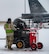 A 5th Aircraft Maintenance Squadron crew chief waits by a heater cart before starting pre-flight procedures for a B-52H Stratofortress at Minot Air Force Base, North Dakota, Nov. 27, 2023. 5th AMXS crew chiefs work around the clock in all-weather conditions to provide B-52H Stratofortress firepower on demand.(U.S. Air Force photo by Airman 1st Class Alexander Nottingham)