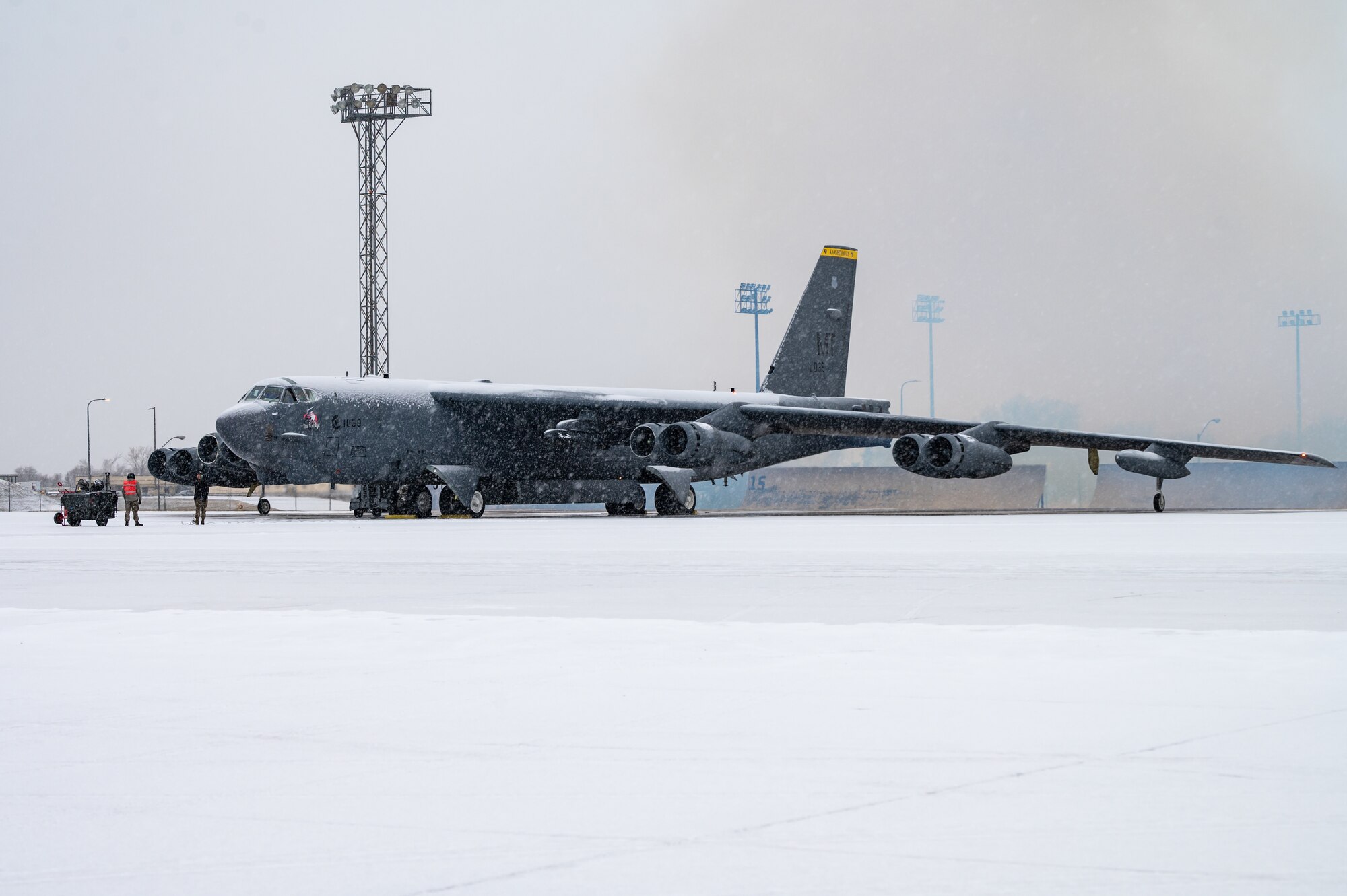 5th Aircraft Maintenance Squadron crew chiefs perform pre-flight procedures on a B-52H Stratofortress at Minot Air Force Base, North Dakota, Nov. 27, 2023. 5th AMXS crew chiefs work around the clock in all-weather conditions to provide B-52H Stratofortress firepower on demand.(U.S. Air Force photo by Airman 1st Class Alexander Nottingham)