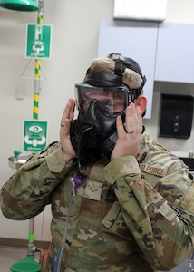 Airman 1st Class Eric Morgan, a power production specialist with the 127th Civil Engineer Squadron, participates in a gas mask fit test at Selfridge Air National Guard Base, Michigan, Oct. 14, 2023.