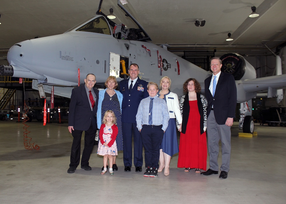 Lt. Col. Shannon Vickers takes a family photo following a ceremony during which he took command of the 127th Operations Support Squadron at Selfridge Air National Guard Base, Michigan, Oct. 13, 2023.