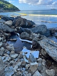 Oil clean-up site at Lindbergh Bay, St. Thomas, U.S. Virgin Islands, Nov. 27, 2023.  Since response efforts began following the Oct. 25, 2023, tank 11 diesel discharge at the Virgin Islands Water and Power Authority Randolph Harley Power Plant, oil recovery crews at the facility have collected approximately 26,000 gallons of oily water mixture and they have removed 150 cubic yards of contaminated soil. In the Lindbergh Bay clean-up site, oil recovery crews have collected 7,900 gallons of oily water mixture and removed 72 cubic yards of contaminated soil. (U.S. Coast Guard photo)