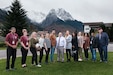 Yellow Ribbon Event staff take a break for a group photo at a reintegration event hosted by the 446th Movement Control Battalion, 510th Regional Support Group, 7th Mission Support Command, at the Edelweiss Lodge and Resort, Garmisch-Partenkirchen, Germany, Nov. 3-5, 2023. The 7th MSC coordinated the Yellow Ribbon event to allow Soldiers and their families to relax, recharge and reintegrate. (U.S. Army photo by Staff Sgt. Thomas Mort)