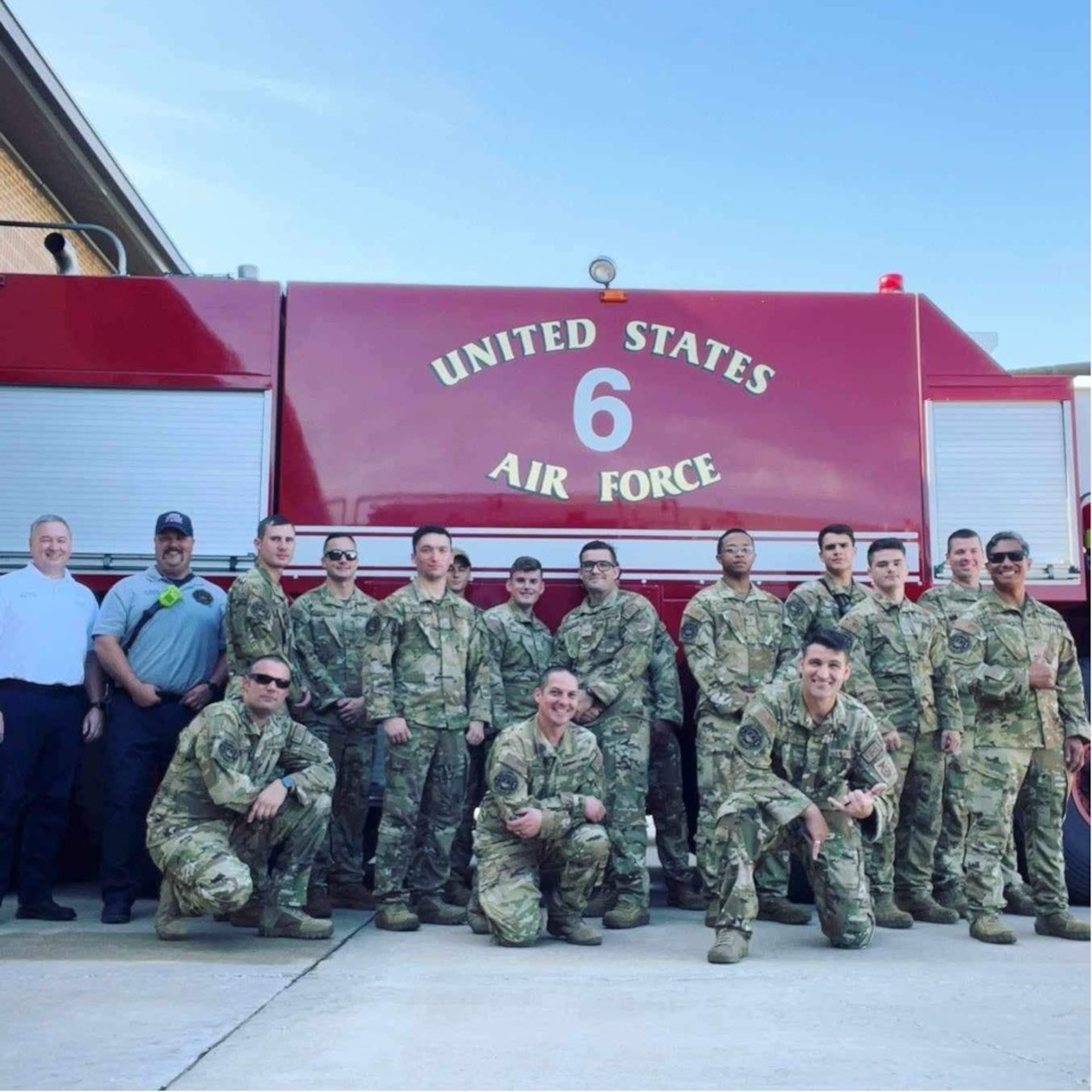 A group of people pose for a photo.