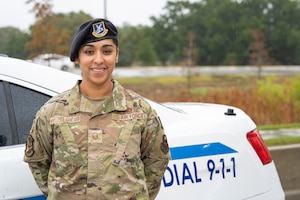 U.S. Air Force Master Sgt. Jessica Martinez-Santana, 81st Security Forces Squadron operations NCO in charge, assists a Defender at the Division Street gate on Keesler Air Force Base, Mississippi, Nov. 15, 2023.