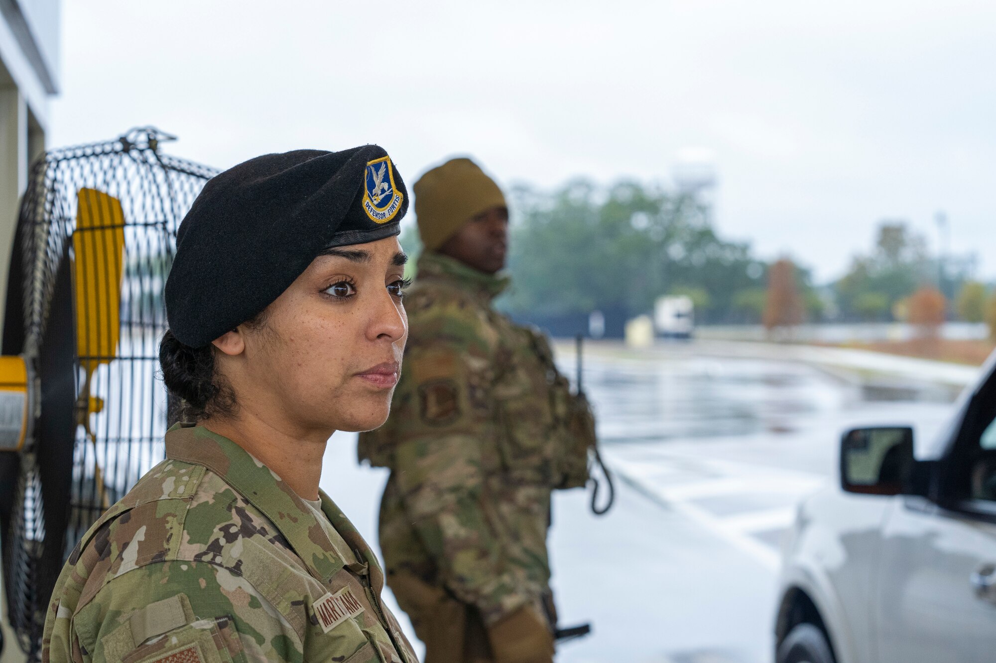 U.S. Air Force Master Sgt. Jessica Martinez-Santana, 81st Security Forces Squadron operations NCO in charge, monitors cars coming through the Division Street gate on Keesler Air Force Base, Mississippi, Nov. 14, 2023.