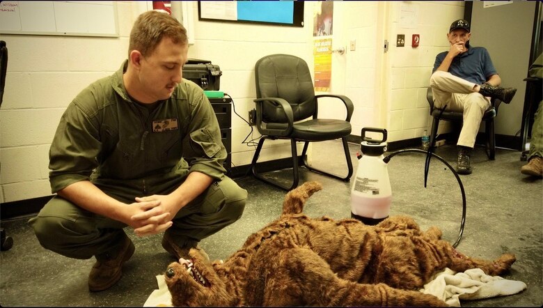 The robotic training dog named “Fitz” after Col. Michael Fitzgerald, former commanding officer of Marine Corps Logistics Base Albany, is utilized by military working dog handlers on the installation. Fitz can bark, whine and be used to practice various emergency scenarios. The nearest emergency veterinarian is a considerable distance away from MCLB Albany, so the handlers are effectively the first responders when their MWDs are injured or ill. (U.S. Marine Corps photo by Jonathan Wright)