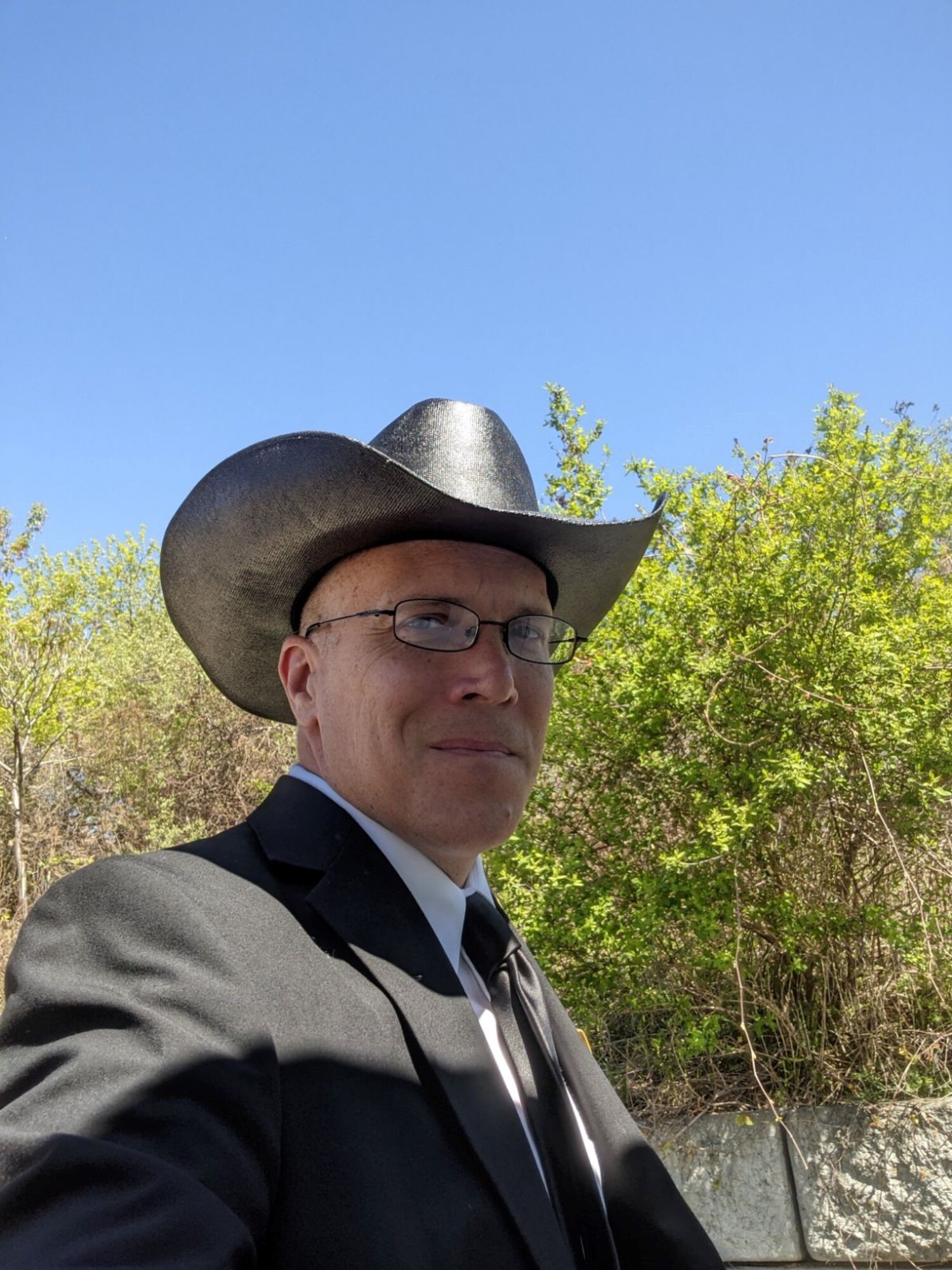 Image of Master Sgt. Alan Hitchings in civilian clothing, outdoors.
