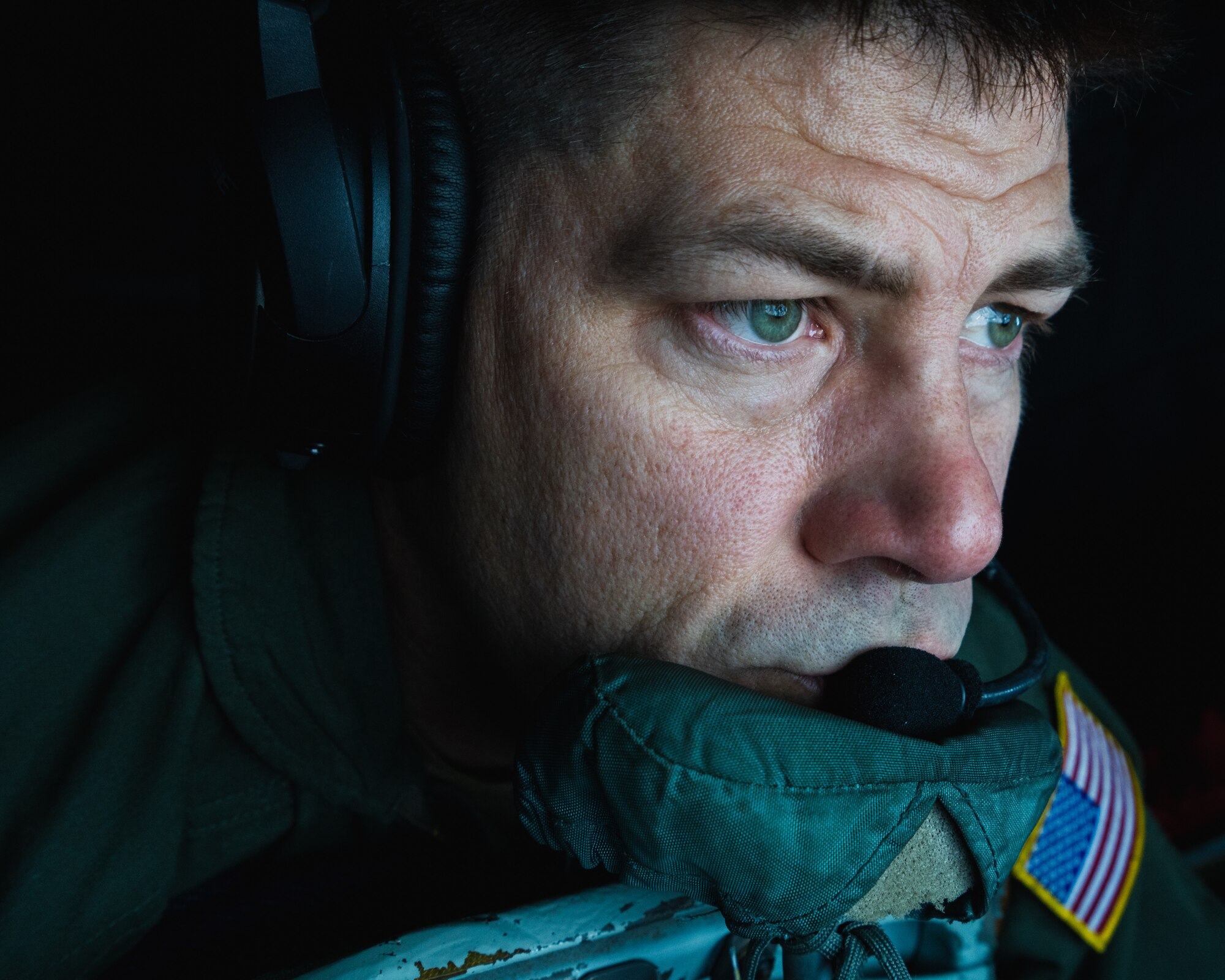 U.S. Air Force Staff Sgt. Robert Huesgen, 63rd Air Refueling Squadron boom operator, performs aerial refueling duties over the Southeastern United States, Nov. 28, 2023.