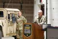 Alaska Army National Guard Lt. Col. Luke Bushatz, commander of 1st Battalion, 297th Infantry Regiment, speaks to family members, friends, and fellow Guardsmen who came together to pay tribute to Soldiers of Bravo Company, 1-297th, during a deployment ceremony at the Alaska National Guard Armory on Joint Base Elmendorf-Richardson, Sept. 29, 2023.