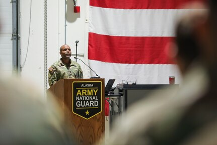 Alaska Army National Guard Capt. Richard Collins, Bravo Company commander, encourages his troops to obtain personal and professional goals while deployed during a ceremony at the Alaska National Guard Armory on Joint Base Elmendorf-Richardson, Sept. 29, 2023.